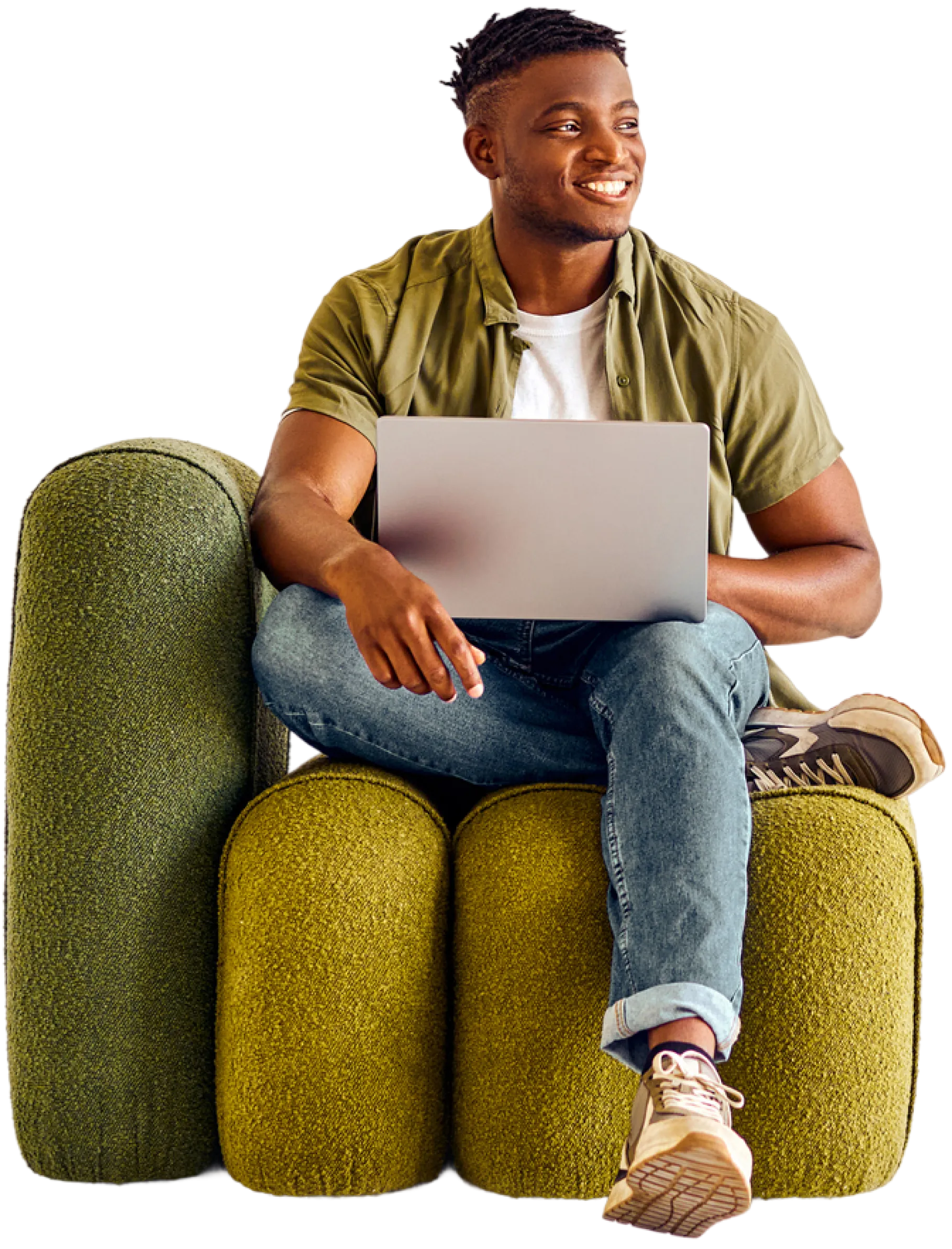 Young man holding laptop sitting on couch